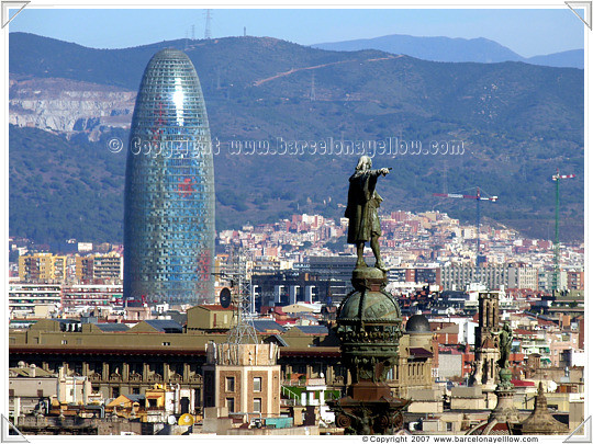 Barcelona Torre Agbar and Columbus statue